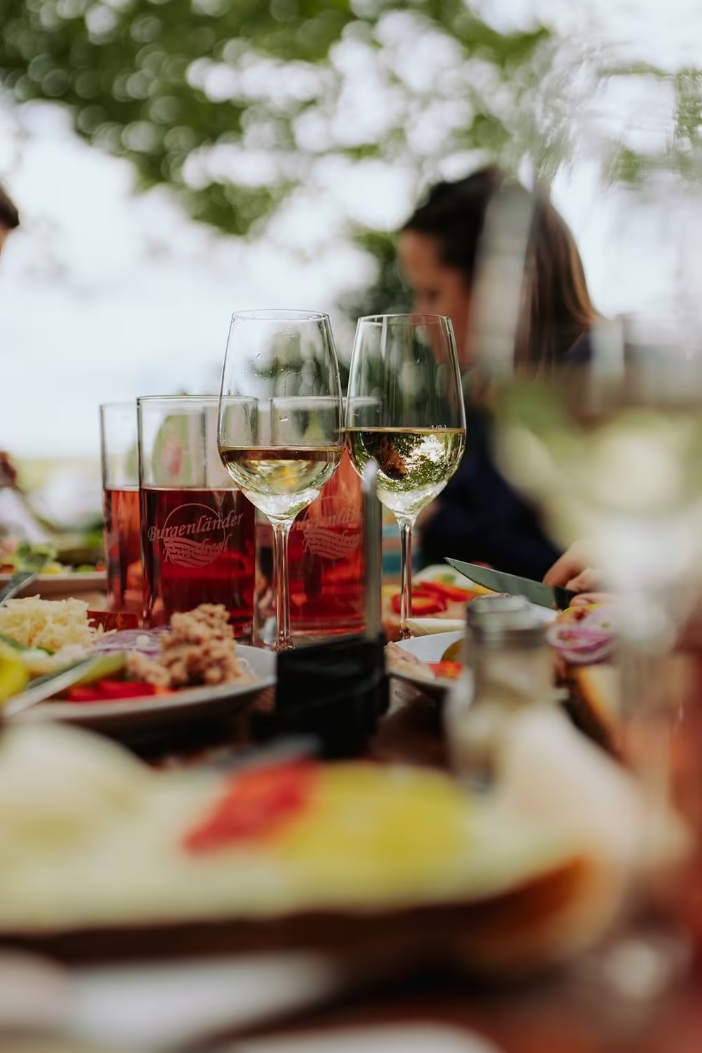 White wine and rosé on a table outdoors